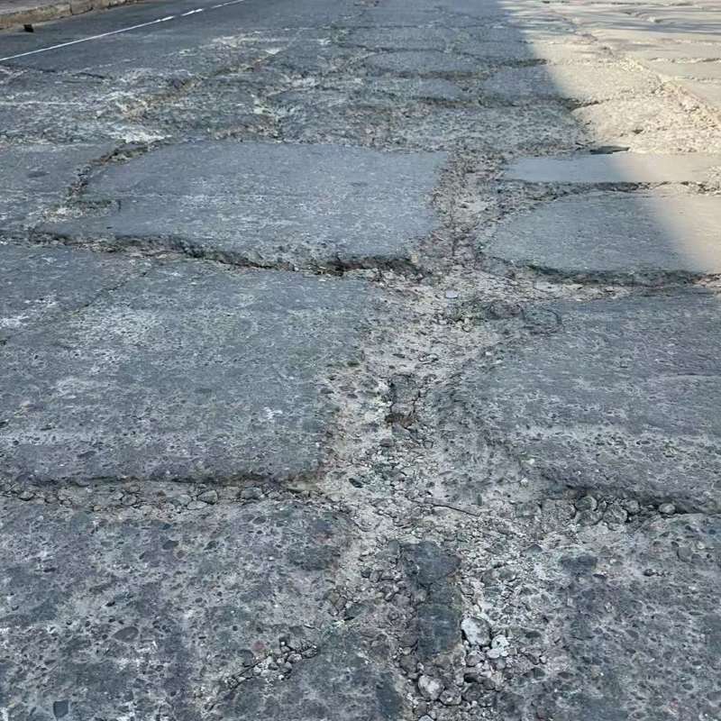 虎亭路面起砂露石子修补料